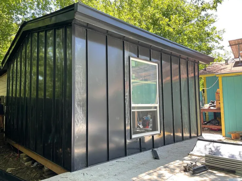 Black standing seam metal wall panels for Roof Inspection in Elk Ridge