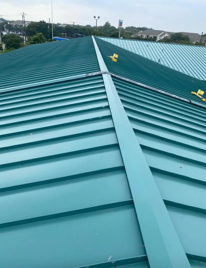 Green commercial metal roof ridge and valley for Metal Roof Repair in Elk Ridge
